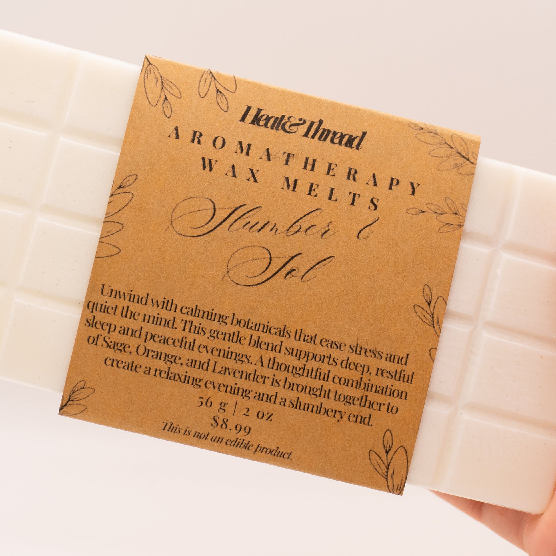 Aromatherapy wax melts with a branded card on a white background